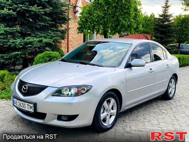 Серый Мазда 3, объемом двигателя 1.6 л и пробегом 250 тыс. км за 4500 $, фото 1 на Automoto.ua
