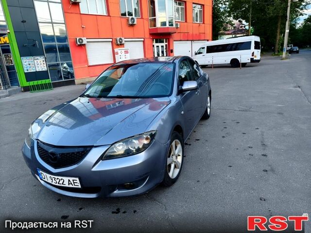 Сірий Мазда 3, об'ємом двигуна 2 л та пробігом 350 тис. км за 3450 $, фото 1 на Automoto.ua