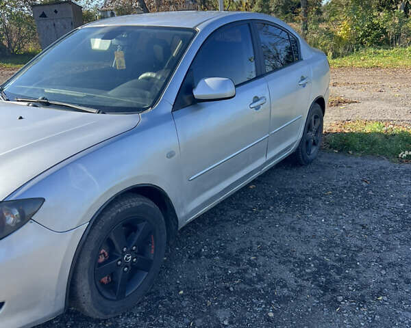 Серый Мазда 3, объемом двигателя 1.56 л и пробегом 335 тыс. км за 3300 $, фото 1 на Automoto.ua