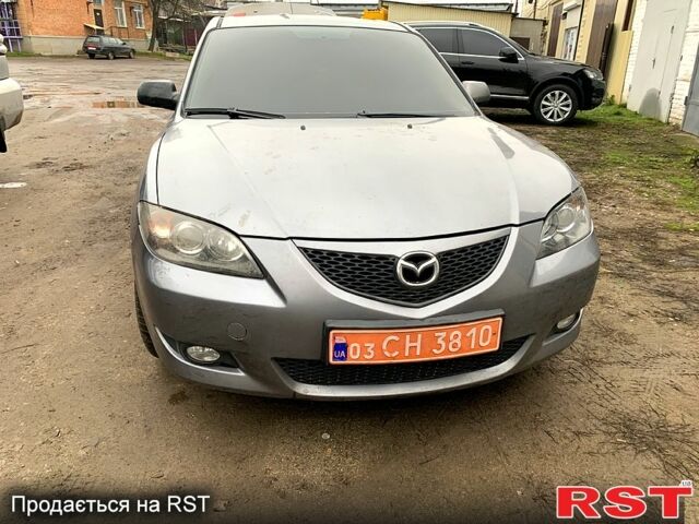 Серый Мазда 3, объемом двигателя 1.6 л и пробегом 117 тыс. км за 4200 $, фото 1 на Automoto.ua