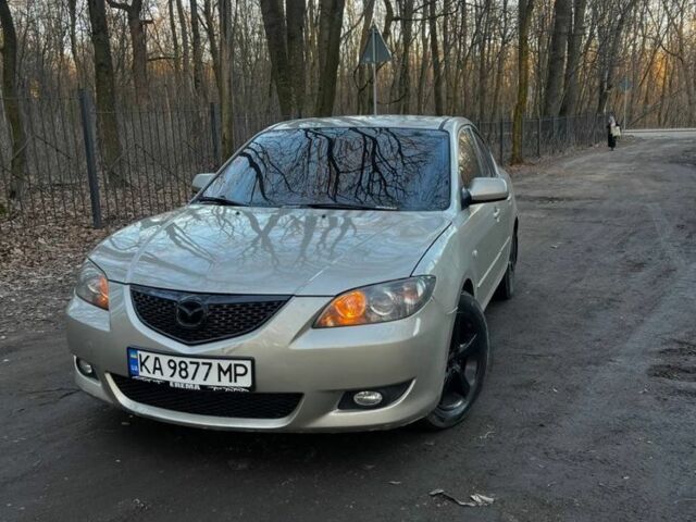 Серый Мазда 3, объемом двигателя 1.6 л и пробегом 380 тыс. км за 4000 $, фото 1 на Automoto.ua