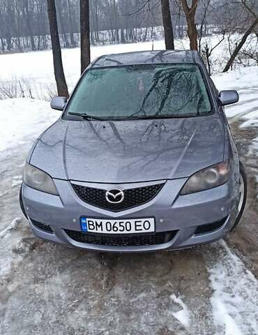 Серый Мазда 3, объемом двигателя 1.6 л и пробегом 362 тыс. км за 3999 $, фото 1 на Automoto.ua