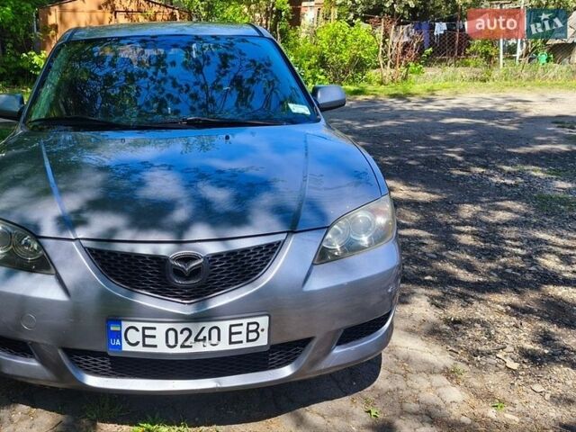 Серый Мазда 3, объемом двигателя 2 л и пробегом 190 тыс. км за 3500 $, фото 1 на Automoto.ua