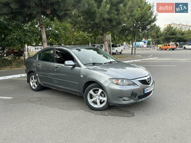 Серый Мазда 3, объемом двигателя 1.6 л и пробегом 180 тыс. км за 3000 $, фото 1 на Automoto.ua