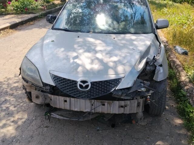 Сірий Мазда 3, об'ємом двигуна 1 л та пробігом 2 тис. км за 336 $, фото 1 на Automoto.ua