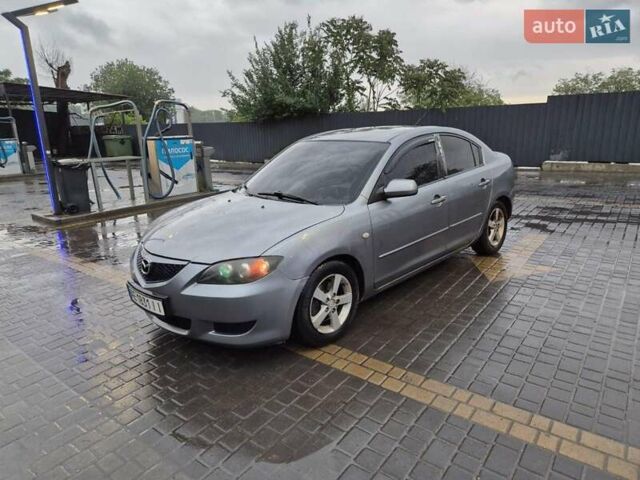 Серый Мазда 3, объемом двигателя 1.6 л и пробегом 270 тыс. км за 4495 $, фото 1 на Automoto.ua