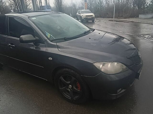 Сірий Мазда 3, об'ємом двигуна 10 л та пробігом 304 тис. км за 2700 $, фото 1 на Automoto.ua