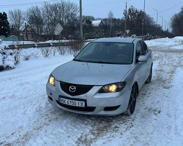 Сірий Мазда 3, об'ємом двигуна 1.6 л та пробігом 325 тис. км за 3000 $, фото 1 на Automoto.ua