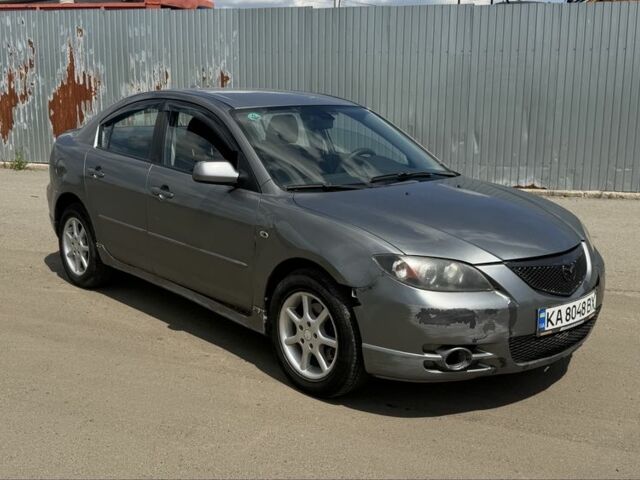 Сірий Мазда 3, об'ємом двигуна 2 л та пробігом 200 тис. км за 2800 $, фото 1 на Automoto.ua