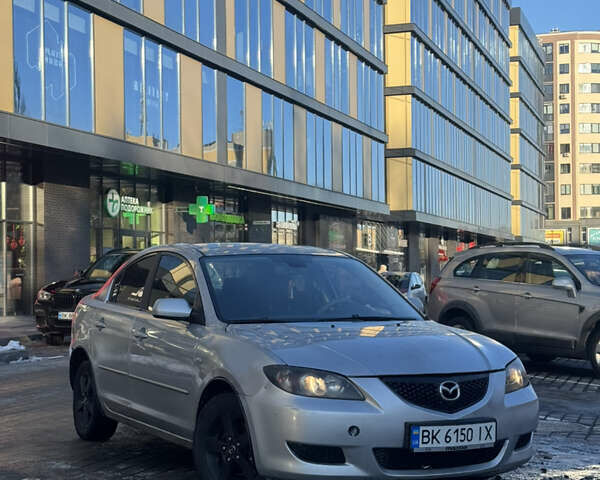 Серый Мазда 3, объемом двигателя 1.6 л и пробегом 367 тыс. км за 2900 $, фото 1 на Automoto.ua