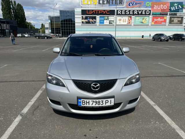 Серый Мазда 3, объемом двигателя 1.6 л и пробегом 144 тыс. км за 4400 $, фото 1 на Automoto.ua