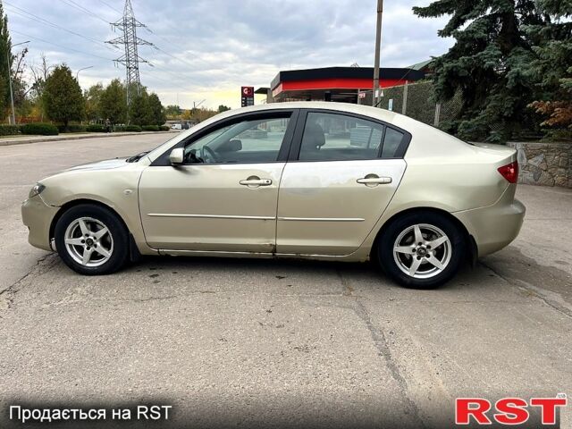 Серый Мазда 3, объемом двигателя 1.6 л и пробегом 250 тыс. км за 2650 $, фото 1 на Automoto.ua