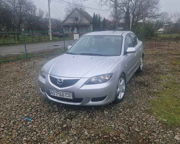 Серый Мазда 3, объемом двигателя 1.6 л и пробегом 240 тыс. км за 4500 $, фото 1 на Automoto.ua