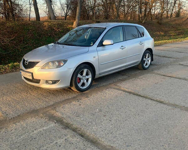 Сірий Мазда 3, об'ємом двигуна 1.56 л та пробігом 315 тис. км за 3999 $, фото 1 на Automoto.ua