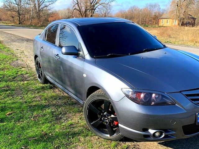 Серый Мазда 3, объемом двигателя 2.3 л и пробегом 229 тыс. км за 4500 $, фото 1 на Automoto.ua