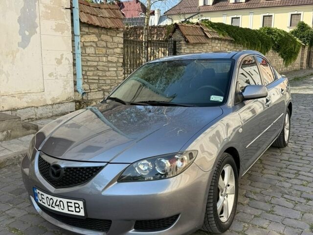Серый Мазда 3, объемом двигателя 2 л и пробегом 193 тыс. км за 3800 $, фото 1 на Automoto.ua