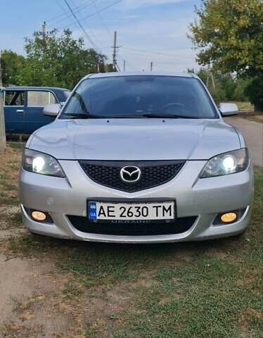 Серый Мазда 3, объемом двигателя 1.56 л и пробегом 250 тыс. км за 3900 $, фото 1 на Automoto.ua