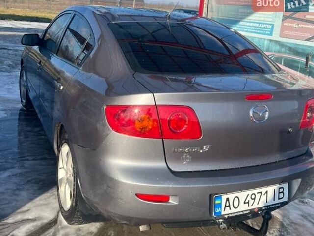 Сірий Мазда 3, об'ємом двигуна 1.56 л та пробігом 211 тис. км за 3900 $, фото 1 на Automoto.ua