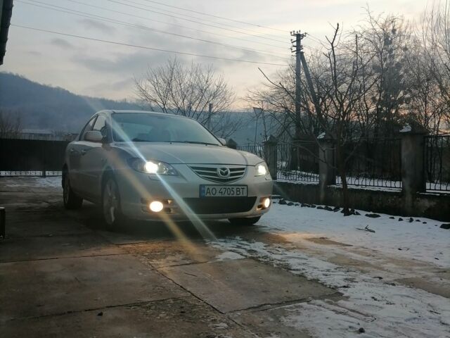 Серый Мазда 3, объемом двигателя 2 л и пробегом 270 тыс. км за 2700 $, фото 1 на Automoto.ua