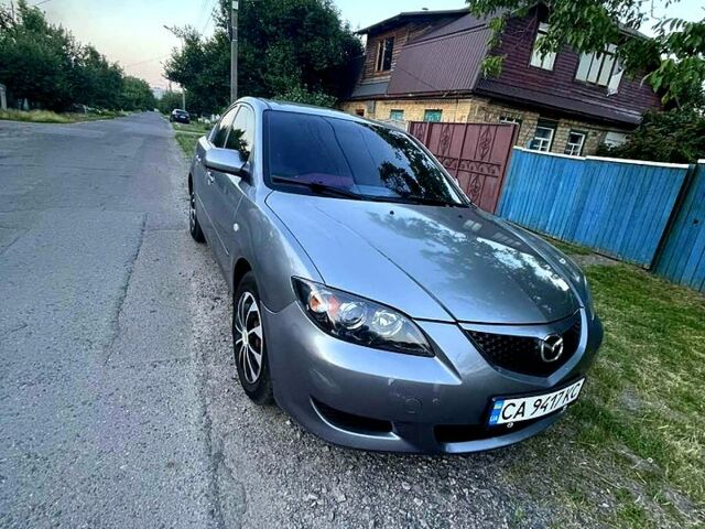 Серый Мазда 3, объемом двигателя 1.6 л и пробегом 262 тыс. км за 3950 $, фото 1 на Automoto.ua