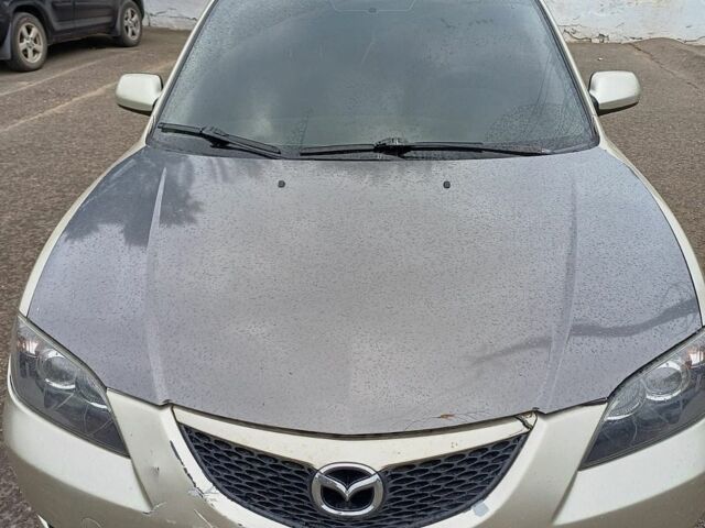 Серый Мазда 3, объемом двигателя 2 л и пробегом 332 тыс. км за 2600 $, фото 1 на Automoto.ua