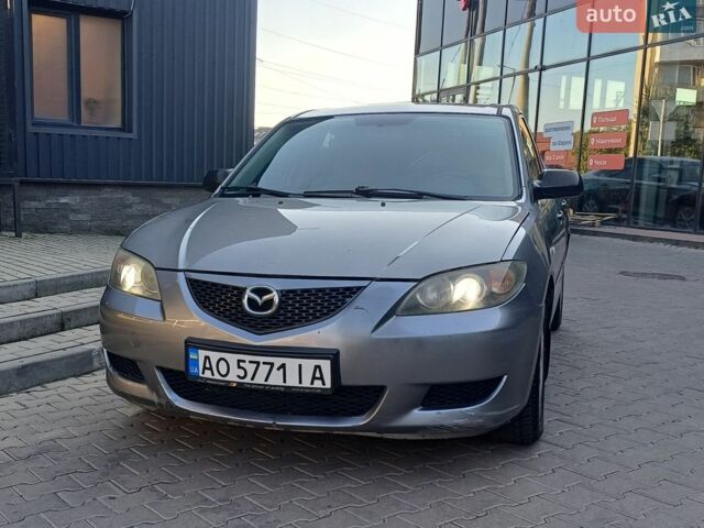 Серый Мазда 3, объемом двигателя 1.6 л и пробегом 311 тыс. км за 3200 $, фото 1 на Automoto.ua