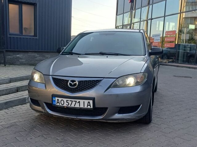 Серый Мазда 3, объемом двигателя 1.6 л и пробегом 300 тыс. км за 3207 $, фото 1 на Automoto.ua