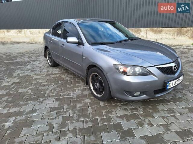 Серый Мазда 3, объемом двигателя 1.6 л и пробегом 260 тыс. км за 4499 $, фото 1 на Automoto.ua