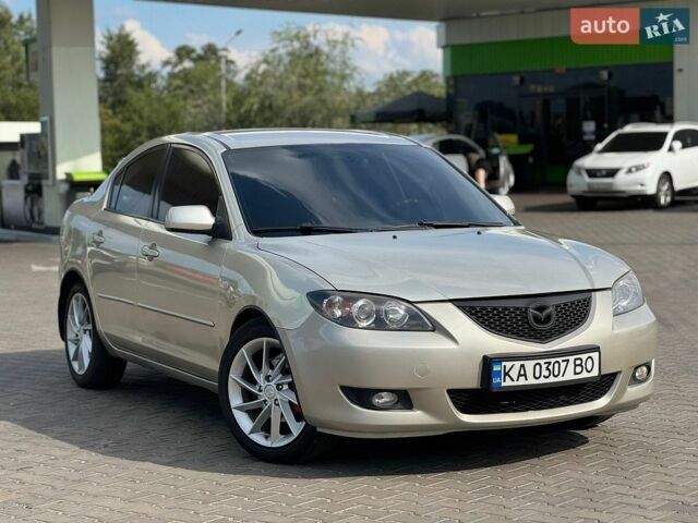 Серый Мазда 3, объемом двигателя 1.6 л и пробегом 200 тыс. км за 4999 $, фото 1 на Automoto.ua