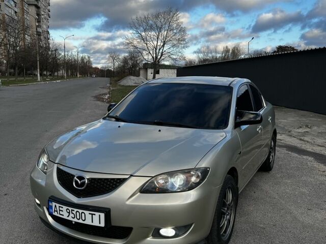 Серый Мазда 3, объемом двигателя 1.6 л и пробегом 314 тыс. км за 3999 $, фото 1 на Automoto.ua