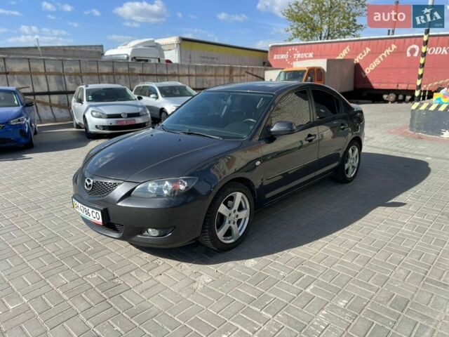 Серый Мазда 3, объемом двигателя 1.6 л и пробегом 138 тыс. км за 5500 $, фото 1 на Automoto.ua
