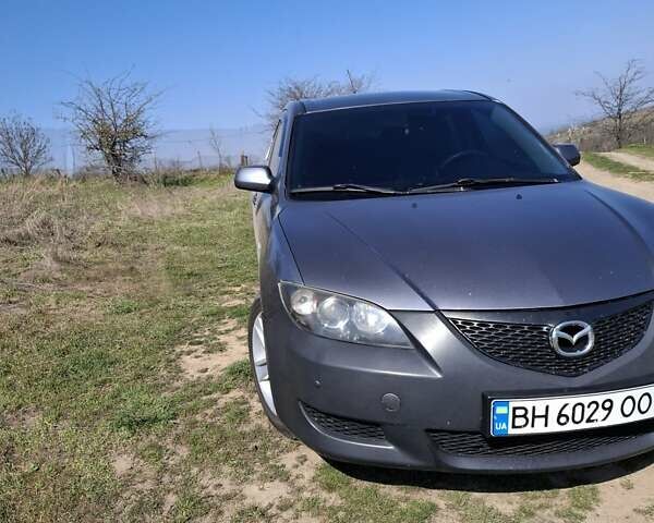Сірий Мазда 3, об'ємом двигуна 2 л та пробігом 160 тис. км за 4200 $, фото 1 на Automoto.ua