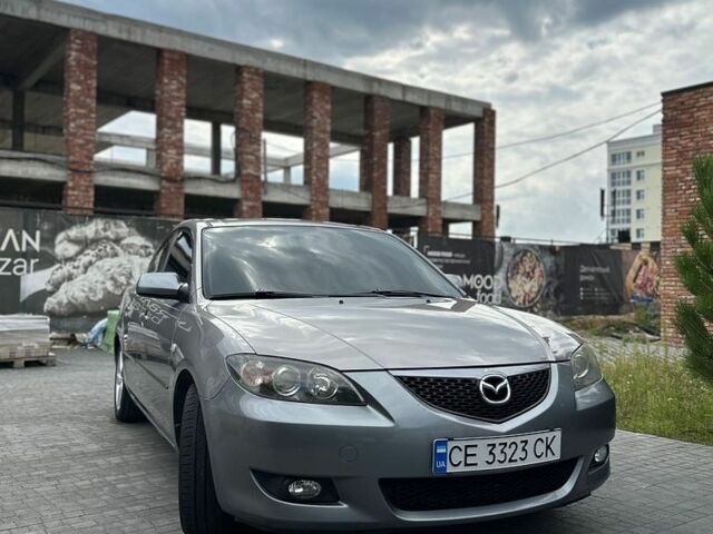 Серый Мазда 3, объемом двигателя 1.6 л и пробегом 305 тыс. км за 4950 $, фото 1 на Automoto.ua