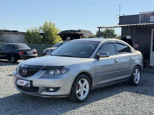 Сірий Мазда 3, об'ємом двигуна 1.6 л та пробігом 209 тис. км за 4112 $, фото 1 на Automoto.ua