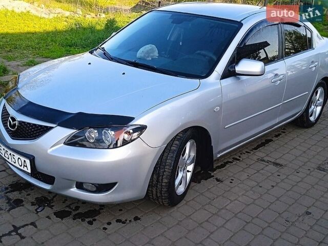 Серый Мазда 3, объемом двигателя 1.6 л и пробегом 230 тыс. км за 5000 $, фото 1 на Automoto.ua