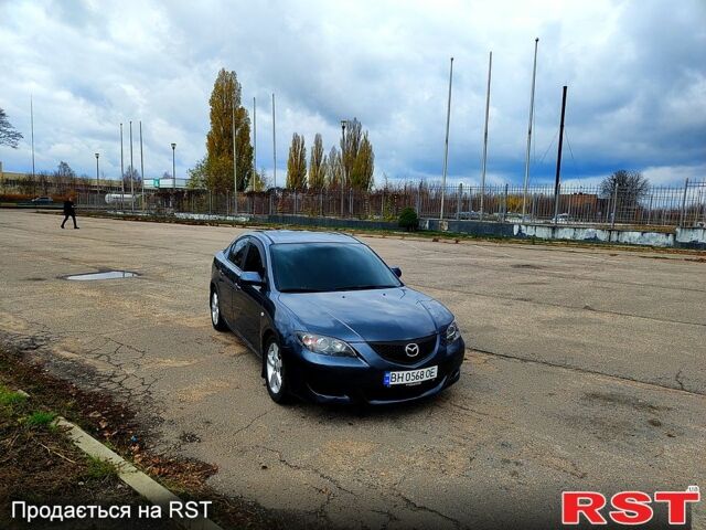 Серый Мазда 3, объемом двигателя 1.6 л и пробегом 250 тыс. км за 4000 $, фото 1 на Automoto.ua