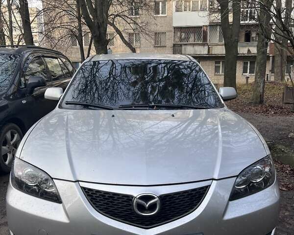 Серый Мазда 3, объемом двигателя 2 л и пробегом 268 тыс. км за 3650 $, фото 1 на Automoto.ua