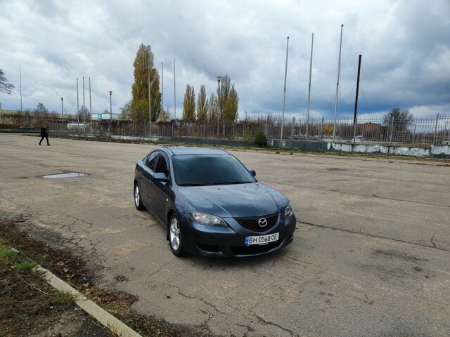Серый Мазда 3, объемом двигателя 1.6 л и пробегом 250 тыс. км за 4000 $, фото 1 на Automoto.ua