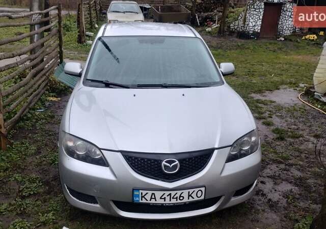 Сірий Мазда 3, об'ємом двигуна 1.6 л та пробігом 287 тис. км за 5500 $, фото 1 на Automoto.ua