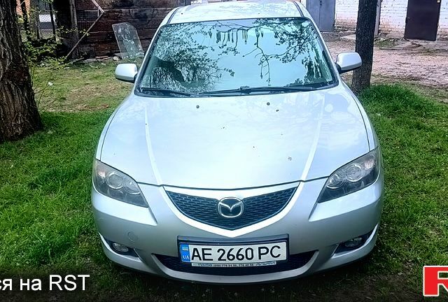 Серый Мазда 3, объемом двигателя 1.6 л и пробегом 205 тыс. км за 4500 $, фото 1 на Automoto.ua