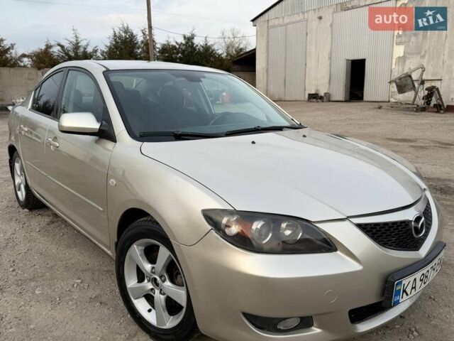 Серый Мазда 3, объемом двигателя 1.6 л и пробегом 213 тыс. км за 4599 $, фото 1 на Automoto.ua