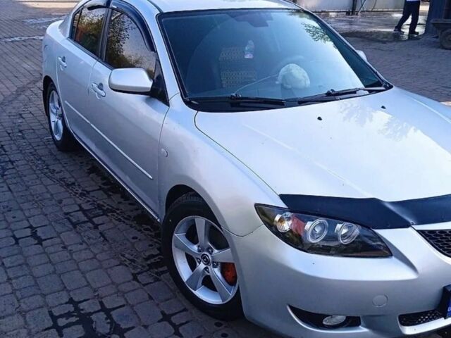 Серый Мазда 3, объемом двигателя 1.6 л и пробегом 250 тыс. км за 4500 $, фото 1 на Automoto.ua