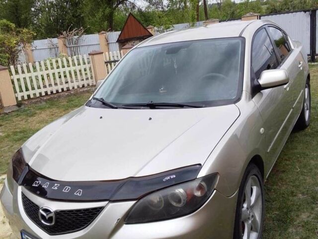 Серый Мазда 3, объемом двигателя 1.6 л и пробегом 315 тыс. км за 3114 $, фото 1 на Automoto.ua