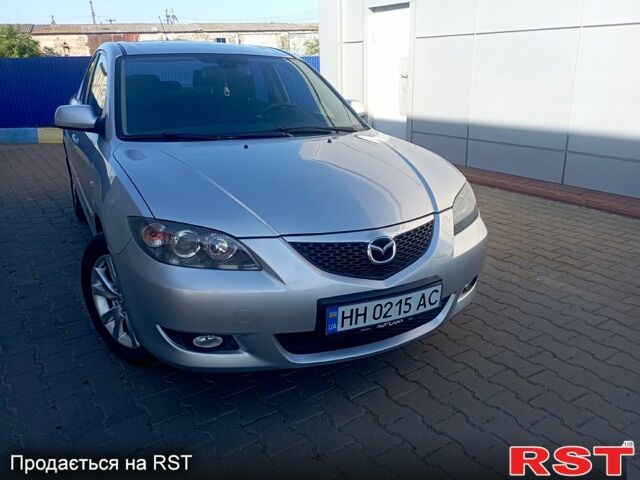 Серый Мазда 3, объемом двигателя 1.6 л и пробегом 226 тыс. км за 5500 $, фото 1 на Automoto.ua