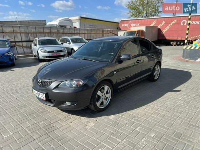 Серый Мазда 3, объемом двигателя 1.6 л и пробегом 138 тыс. км за 5500 $, фото 1 на Automoto.ua