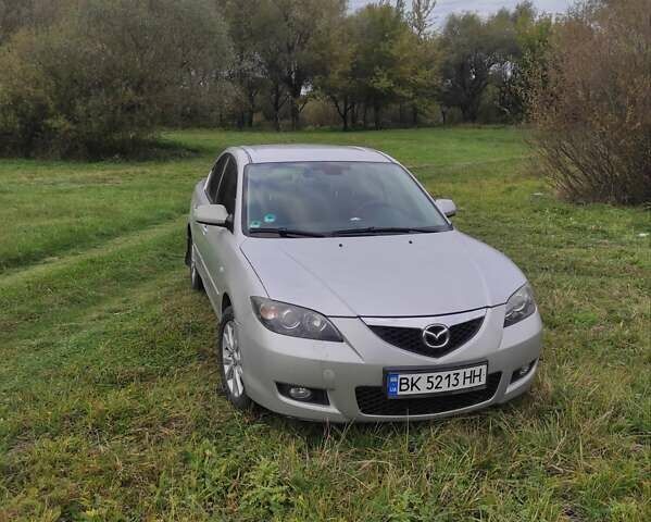 Серый Мазда 3, объемом двигателя 1.6 л и пробегом 170 тыс. км за 5200 $, фото 1 на Automoto.ua
