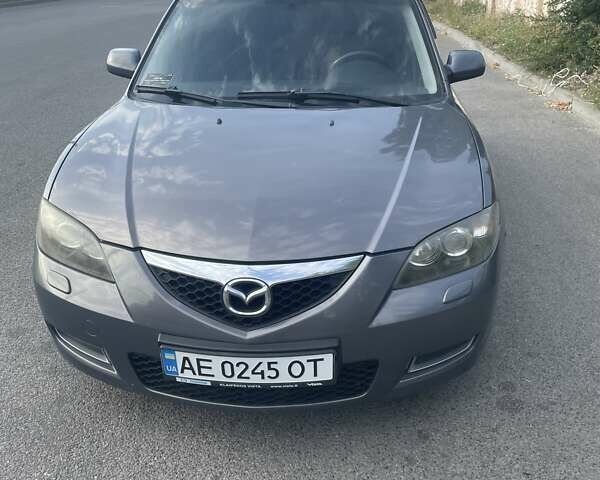 Серый Мазда 3, объемом двигателя 1.6 л и пробегом 325 тыс. км за 3800 $, фото 1 на Automoto.ua