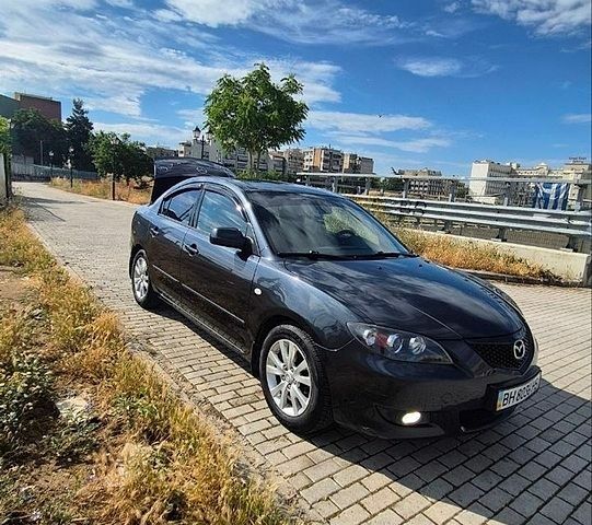 Серый Мазда 3, объемом двигателя 1.6 л и пробегом 199 тыс. км за 5800 $, фото 1 на Automoto.ua