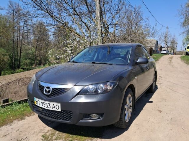 Сірий Мазда 3, об'ємом двигуна 1 л та пробігом 170 тис. км за 3108 $, фото 1 на Automoto.ua