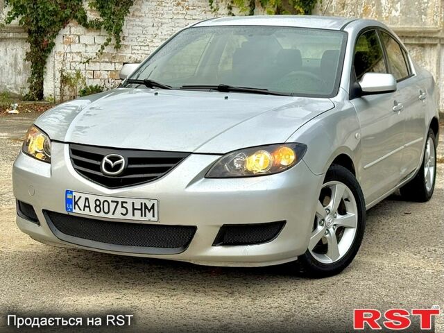 Сірий Мазда 3, об'ємом двигуна 2 л та пробігом 214 тис. км за 4450 $, фото 1 на Automoto.ua